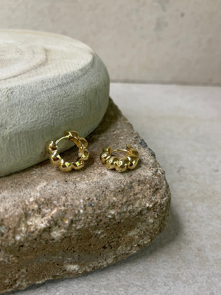 Radiant Twist Gold Dipped Huggie Earrings